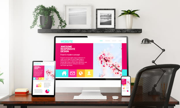A computer, phone, and tablet screen ready for a website redesign 